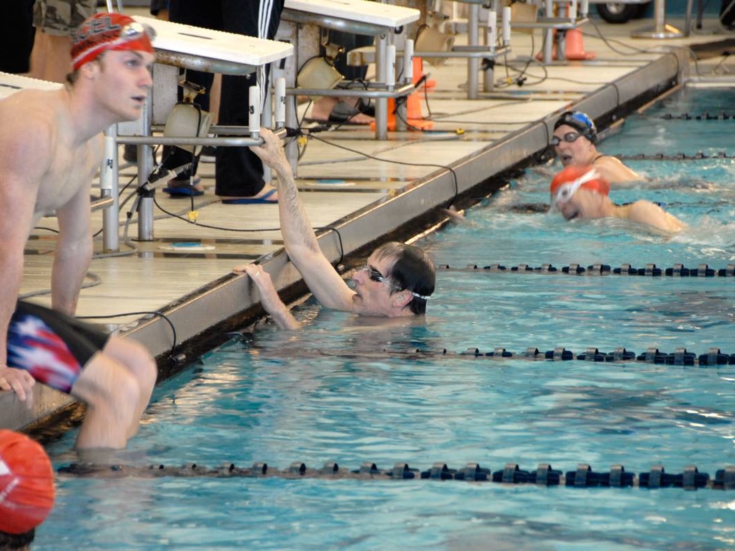 Bruce Ballard participating a swim meet In New York City